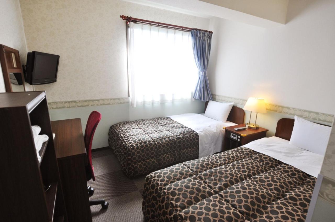 Futsukaichi Green Hotel Chikushino Esterno foto