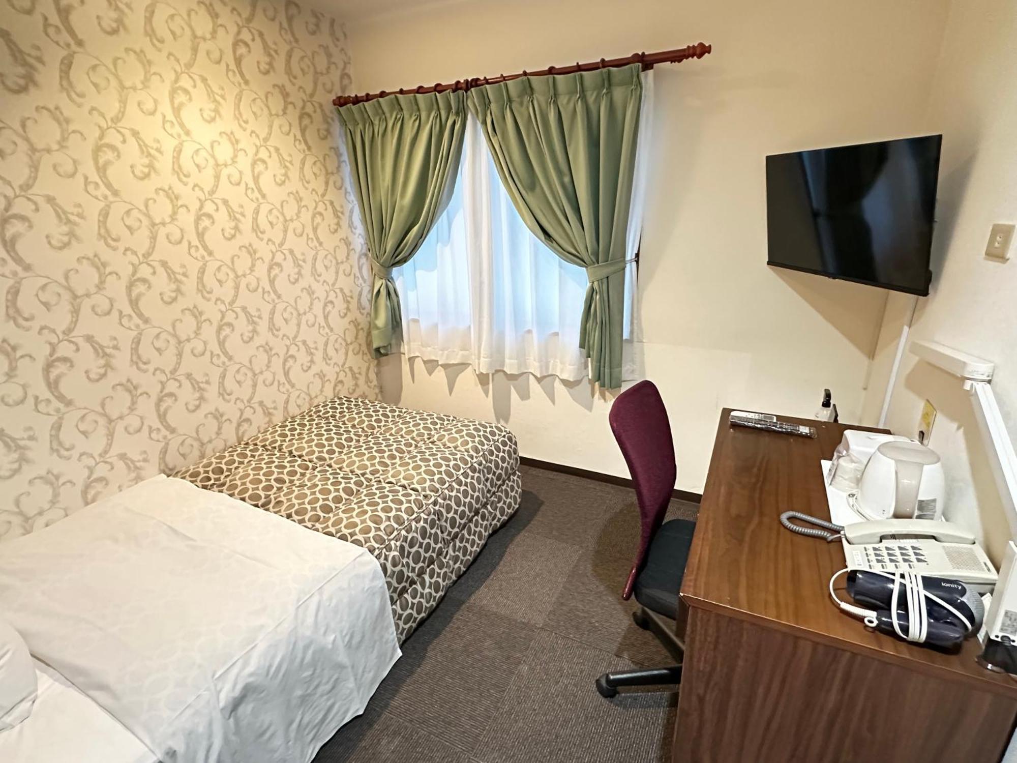 Futsukaichi Green Hotel Chikushino Esterno foto